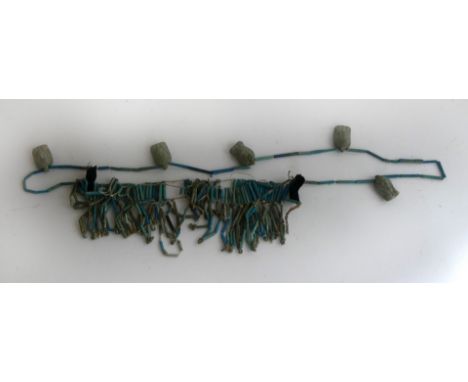 An ancient Egyptian faience necklace The turquoise coloured necklace with various Egyptian amulet heads 