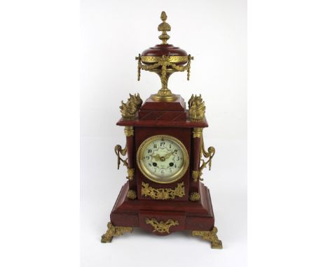 A French mantel clock in elaborate red marble architectural style case,  late 19th/early 20th Century With urn mount, fitted 