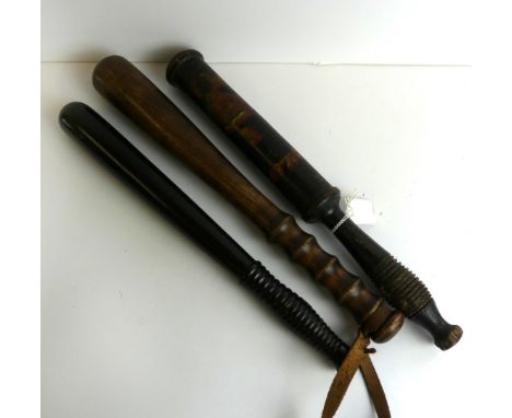 A Queen Victoria painted wooden police truncheon for officer Thompson, mid 19th Century38cm truncheon with Queen Victoria cro