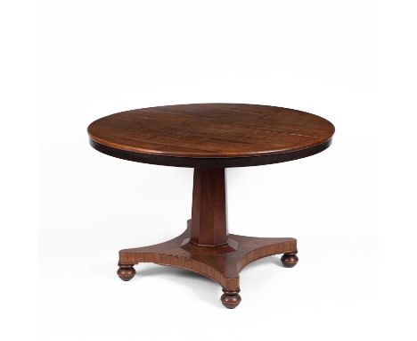 A Victorian mahogany circular breakfast table on column quadrupedal base and bun feet, 115cm in diameter, 75cm highThe top ha