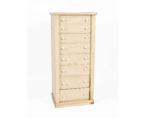 A Victorian white painted collectors cabinet, with eight graduating drawers and ceramic handles, 61cm wide, 46cm deep, 137cm 