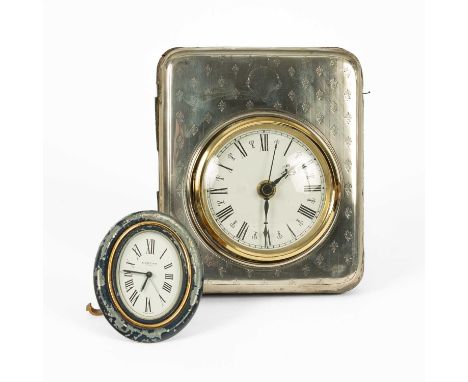 A Cartier blue enamel alarm clock, no. 7509 10195, 9cm high and a silver cased clock (2)