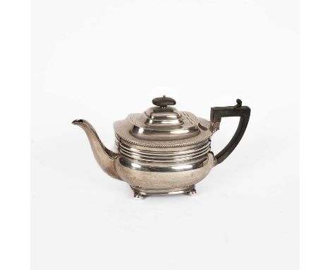 A silver teapot, Asprey &amp; Co. Ltd., London 1913, of oblong shape fitted with an ebonised finial and handle, on ball feet,