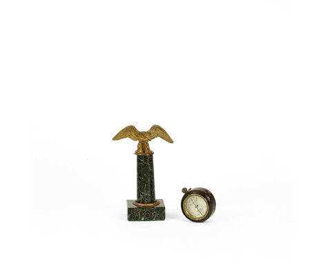 A watch stand in the form of an ormolu eagle on a marble plinth, 14cm high and a small aneroid barometer, Barker &amp; Son, L