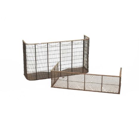A Victorian iron and brass mounted fender, 100cm wide, 31cm deep, 55.5cm high, together with another smaller fender, 94cm wid