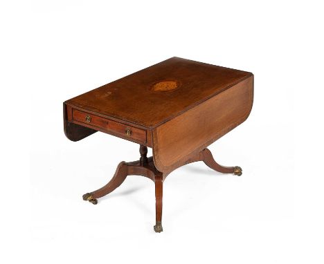 A Regency mahogany and crossbanded centre table, the rectangular top with two drop leaves and a central shell inlay, above tw