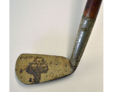 Interesting Sunday golf walking stick-fitted with a golf club iron head handle with flanged sole and stamped with the makers 