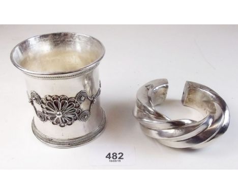 A Burmese white metal wide bangle decorated wirework and another bangle