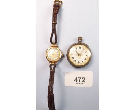 A Victorian silver and enamel fob watch and a 9 carat gold ladies wrist watch