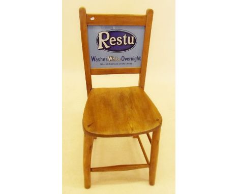 An early 20th century department store chair with enamel double advertising sign back for 'Restu' - 'Washes White Overnight'
