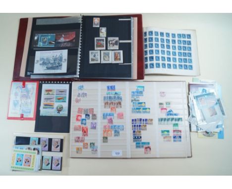 Three all world stamp stockbooks and bag of minisheets, stockcards, booklets etc.  Mint and used defin/commem including those