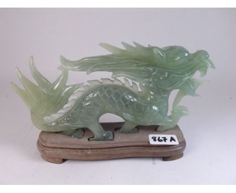 A modern jade style dragon sculpture 25cm long