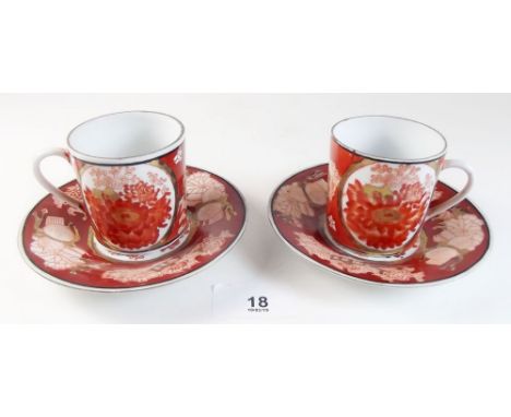 A pair of Chinese coffee cans and saucers