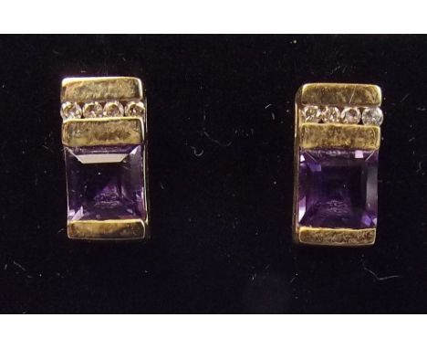 A pair of 9 carat gold Art Deco style amethyst and diamond set earrings