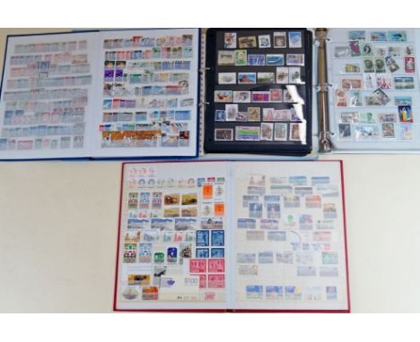 Four stamp stockbooks of mainly GB and British Empire/Commonwealth defin and commem, mint and used.  good mint QEII Canada an