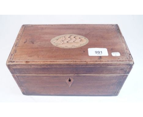 A Georgian mahogany tea caddy with shell inlay and interior caddies