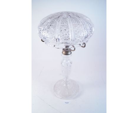 A large early 20th century cut glass table lamp and shade