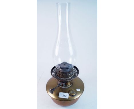 A Veritas brass and copper oil lamp