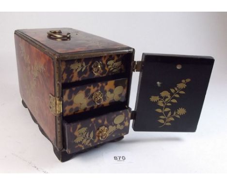 A Japanese lacquer trinket box with gilt floral decoration, single door enclosing three drawer, 18 x 10 x 13cm