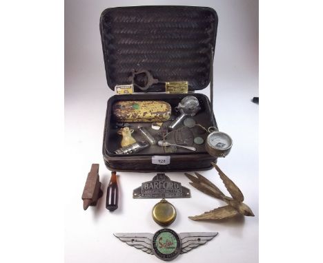 A vintage wicker box (with Ralph Lauren label) containing collectables  including compass, lighter, etc