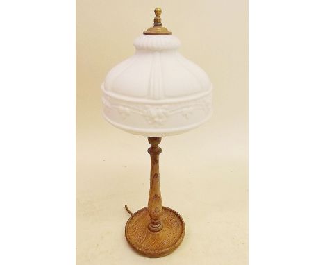 A table lamp with barleytwist stem on beaten pewter base with mottled glass shade and a turned wood table lamp and opaque whi