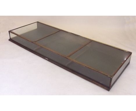 A Victorian mahogany large glazed haberdashery shop counter top display case by Griffiths and Co, Birmingham, with brass yard