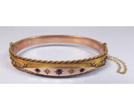 A 9 carat gold Victorian hinged bangle set amethysts and chip diamonds - Chester 1900, 12g