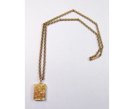 A 9 carat gold book form locket - 5.4g with engraved decoration on gold plated chain