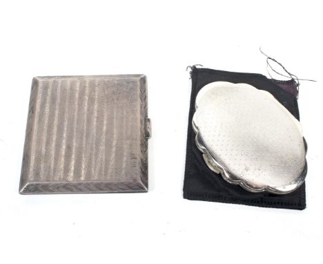 A silver engine turned cigarette case and a Kigu silver shaped-oval compact. The cigarette case with bevelled edges and hallm