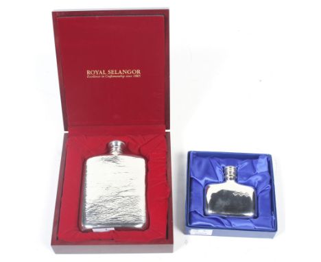 A Royal Selangor textured hip flask and another example. The first with a screw-off cap, in a mahogany case, the second of sm