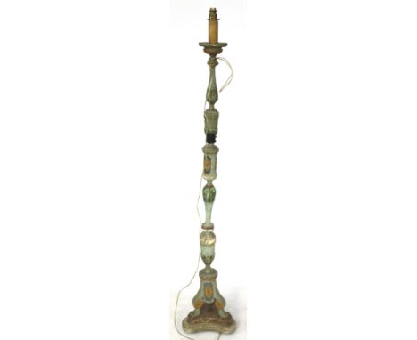 A 19th century European carved and painted wooden standard lamp. With painted gesso decoration of flowers and leaves in blues