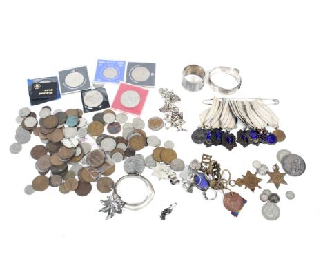 A collection of silver jewellery including a broad hinged bangle, various fob medallions and other items. Together with a qua