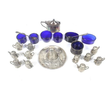 A collection of silver and plated small collectables including a silver oval mustard pot. With a blue glass liner and hallmar