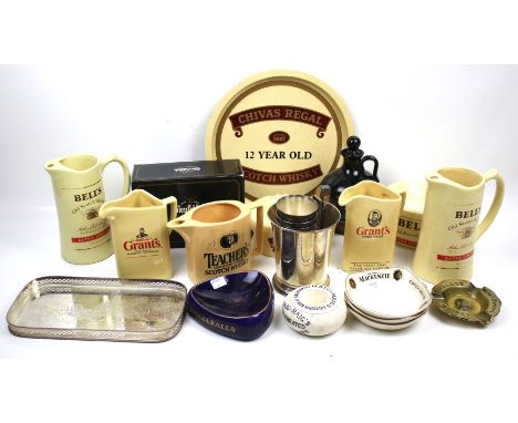 A collection of breweriana. To include a Haig & Haig 'Celebrated Scots Whiskies' round ceramic match strike by S Fielding & C