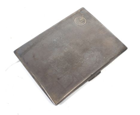 A silver rectangular engine turned cigarette case. With a vacant round reserve engraved with initials 'NJM', hallmarks for Bi