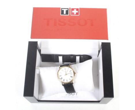 Tissot, a gentleman's gold-plated and stainless steel round wrist watch, ref; T870/970. No.RKN-BC-19338SM, the white dial wit