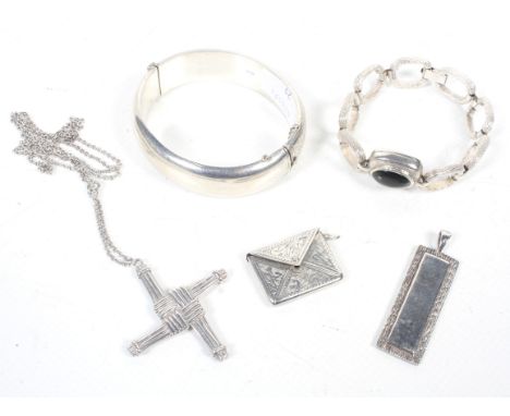 A collection of mostly British silver jewellery including a part foliate engraved hollow hinged bangle with hallmarks for Bir