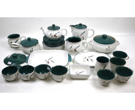 A Denby Pottery tea and dinner service in the 'Greenwheat' pattern. Including cups and saucers, a teapot, tureens, etc.