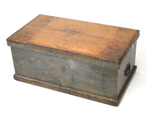 A vintage oak carpenters tool box trunk. The hinged lid opening to reveal a fitted interior, painted blue, on a plinth base, 