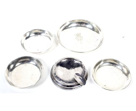 A vintage silver 'Lincoln Imp' round trinket dish, London 1959, 9cm diameter (3 1/2 inches); three other silver pin dishes Lo