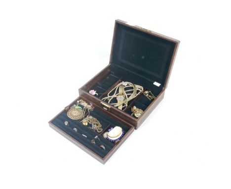 A collection of period rolled-gold jewellery and other items; Including an oval double-sided locket; a fancy rope chain; an o