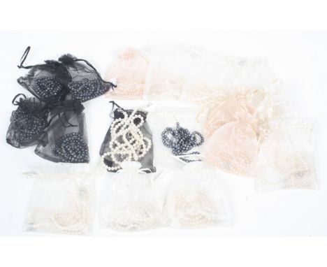 A collection of cultured-freshwater-pearl necklaces and bracelets. Comprising twelve 'white' necklace and bracelet sets and f