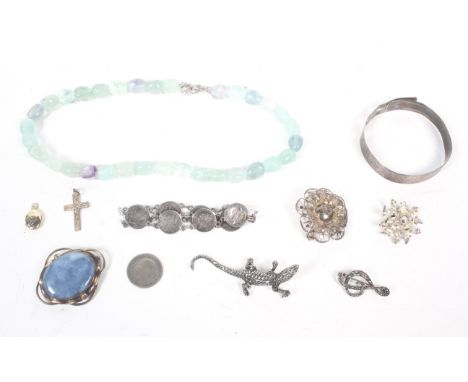 A collection of Victorian and late jewellery. Comprising; a silver bracelet formed from eight Victorian silver threepences; a