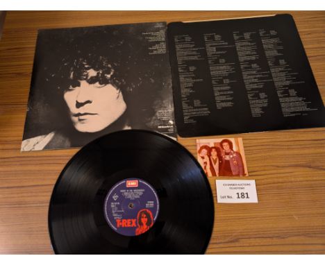 Records: Dandy in the Underworld Signed by Marc Bolan album; dedicated with polaroid photo; BLN5005; Great condition.