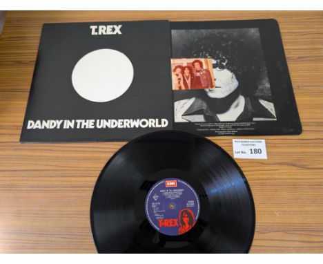 Records: Dandy in the Underworld Signed by Marc Bolan album, dedicated with polaroid photo; BLN5005; Great conditions.