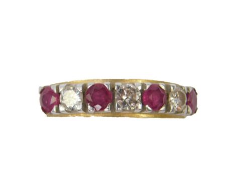 An 18ct gold ruby and diamond seven stone half eternity ring, diamonds approximately 3/8ct, size M, 3.8g. 