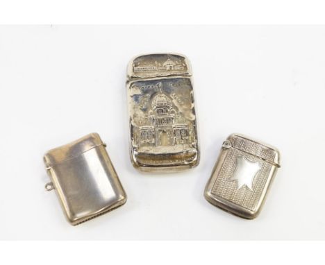 A Victorian silver vesta case, with engine turned decoration, shield reserve, George V vesta case of plain curved form, Birmi