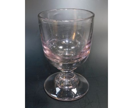 A 19thC amethyst glass rummer, raised on a waisted stem and conical foot, 12.5cm high.