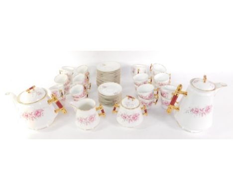 An Altwasser porcelain tea and coffee service, decorated with floral sprays, comprising a teapot, coffee pot, cream jug, sucr