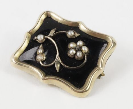 A Victorian serpentine rectangular hair locket morning brooch, decorated in black enamel overlaid with seed pearls and a diam